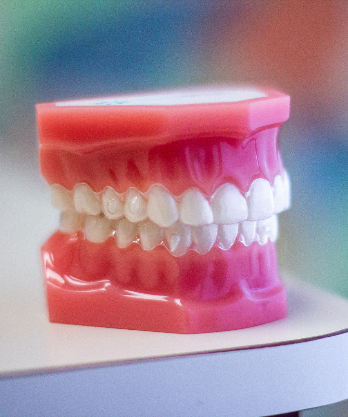 clear invisalign aligners on plastic model