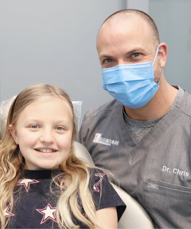 doctor and young patient smiling